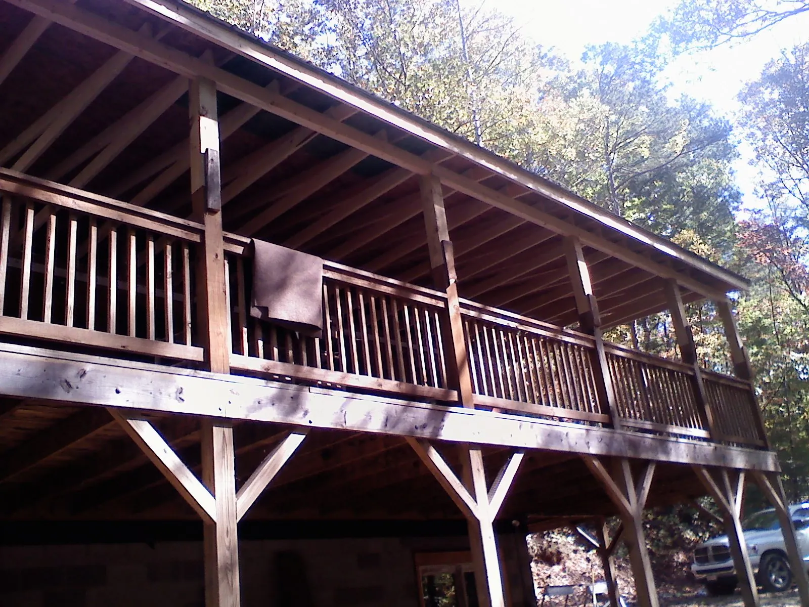 Timber framing under a new elevated porch and deck — Roof Leak Repair in Lockport by Roofing Brothers